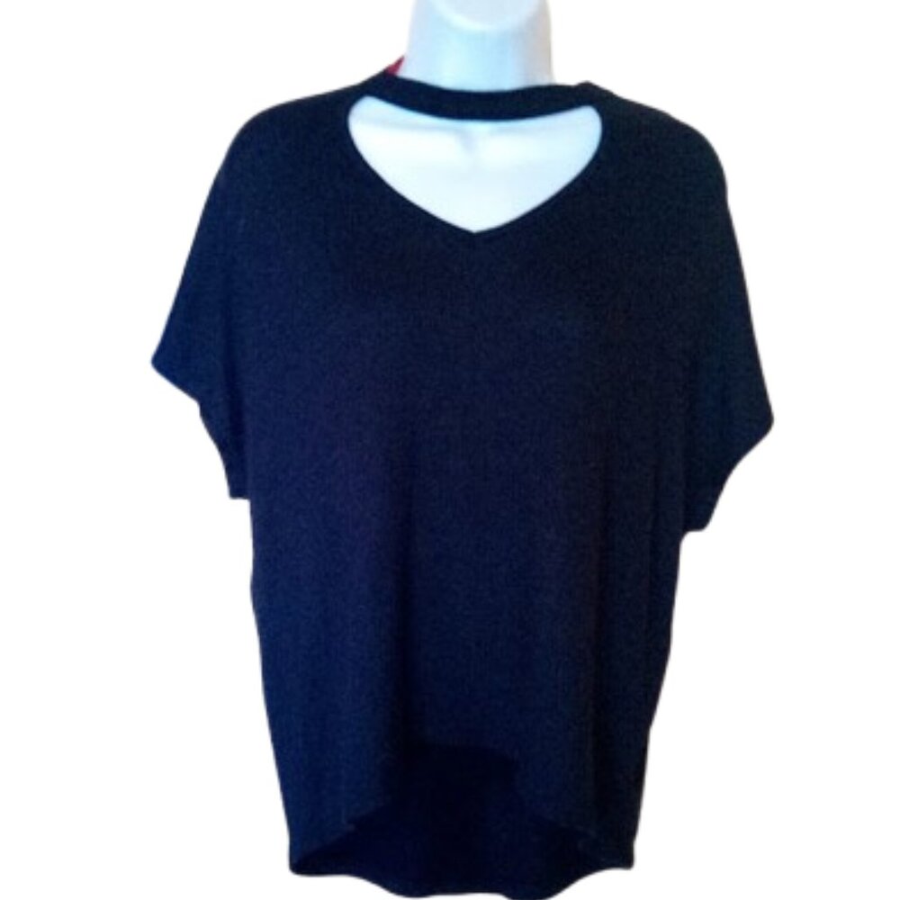 --- Black Short Sleeve Top Size Small but Fits Medium - Large